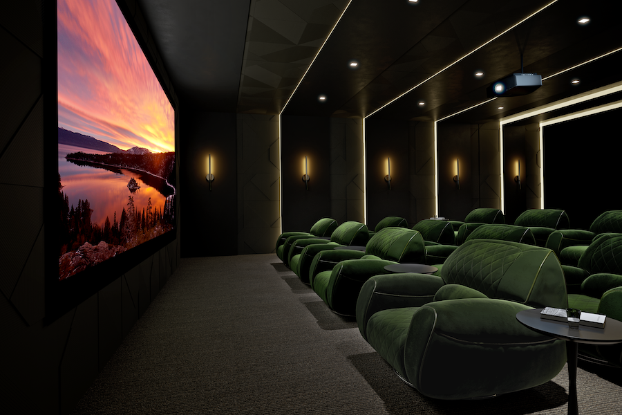 Luxury home theater with green seating and a projected image.
